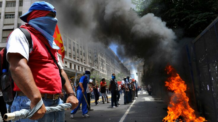 Protestors gathering in front of the Repsol-YPF headquarters in Buenos Aires, demanding the nationalization of the company in December 2008.